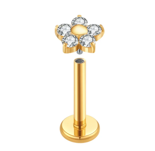 piercing flor titanio dourado