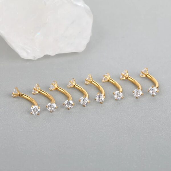 piercing sobrancelha titanio dourado zirconias